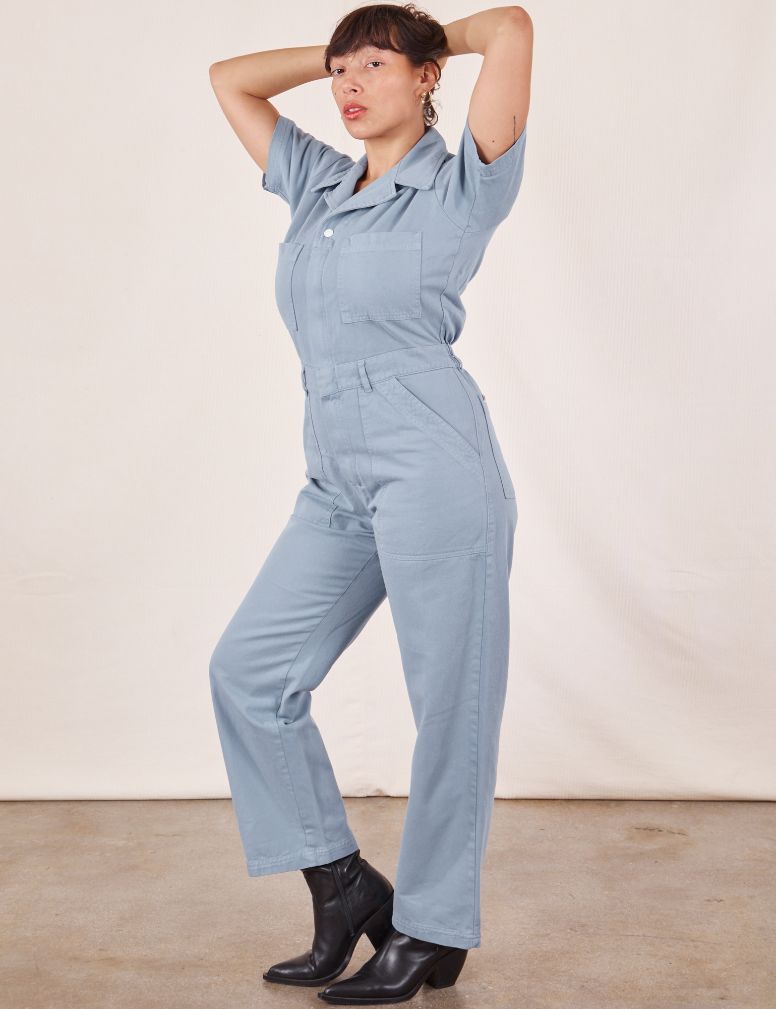 Angled front view of Short Sleeve Jumpsuit in Periwinkle on Tiara