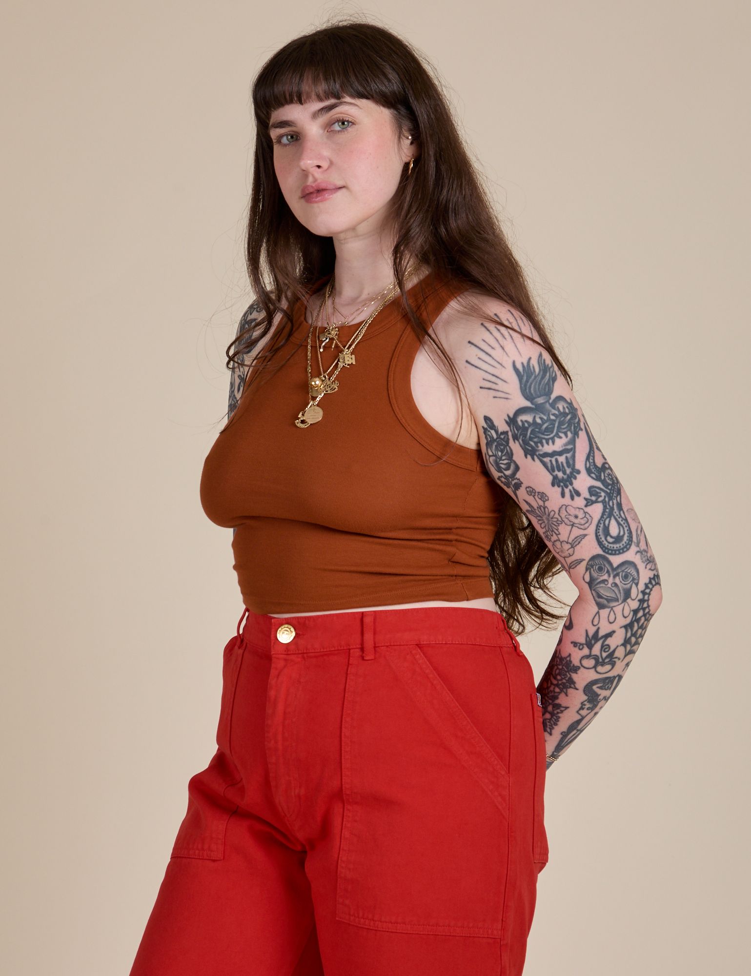 Angled front view of Racerback Tank in Burnt Terracotta on Sydney