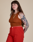 Angled front view of Racerback Tank in Burnt Terracotta on Sydney