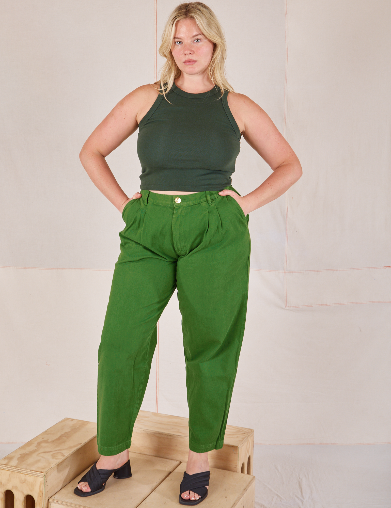 Lish is wearing Racerback Tank in Swamp Green and lawn green Trousers