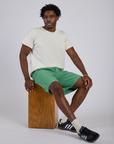 Longline Work Shorts in Seafoam Green and Burly Tee in Vintage Tee White worn by Isaac