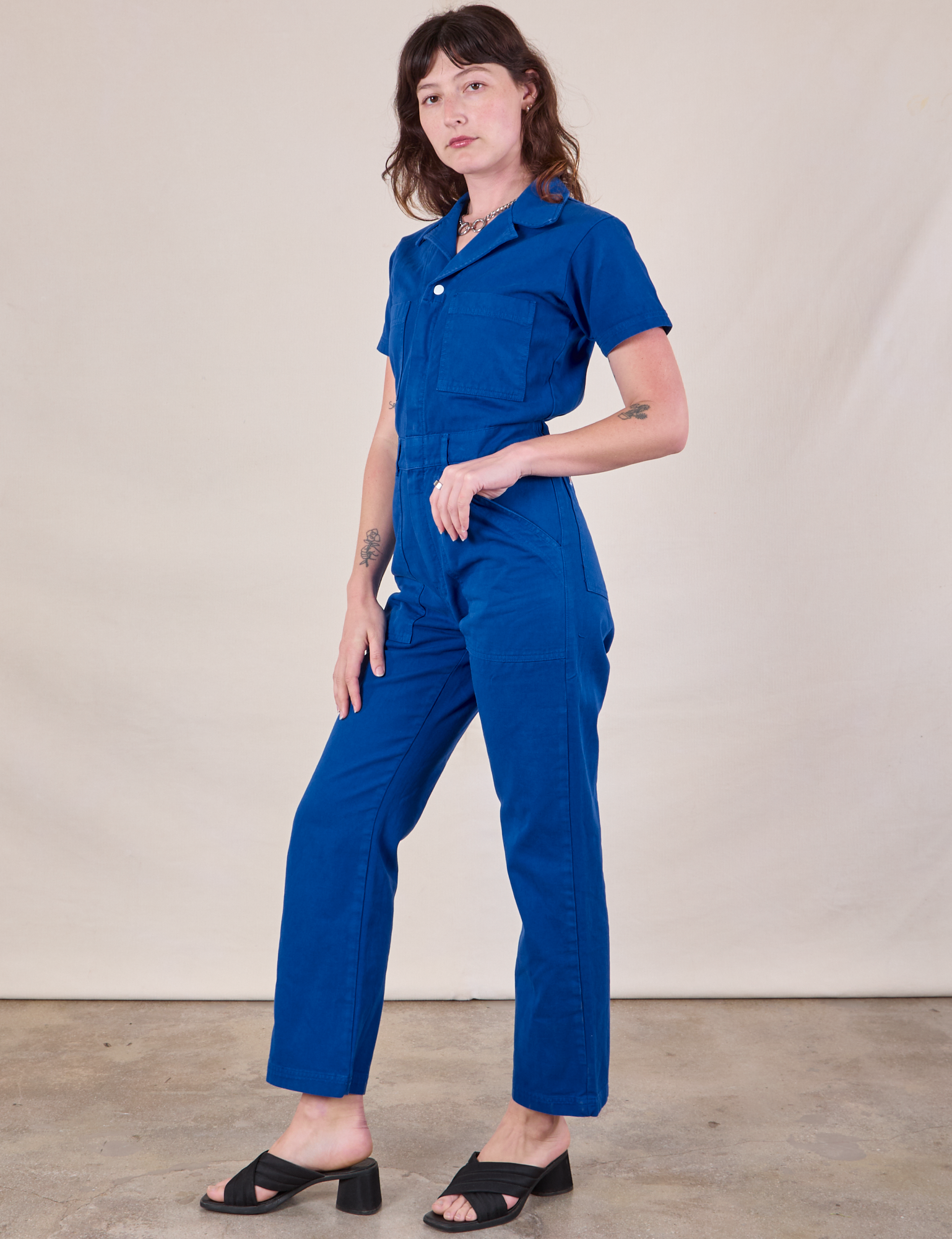 Short Sleeve Jumpsuit in Royal Blue side view on Alex