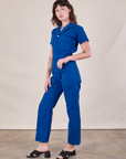 Short Sleeve Jumpsuit in Royal Blue side view on Alex