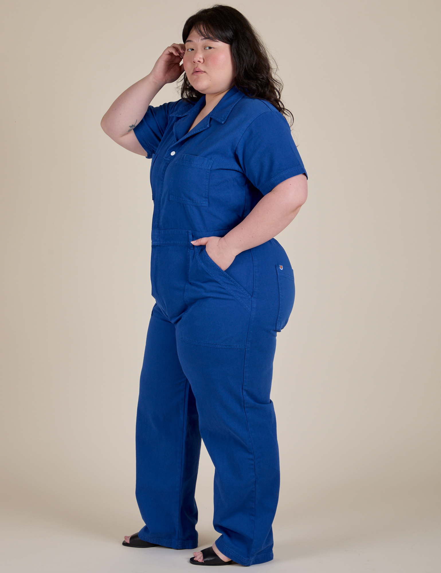 Angled front view of Short Sleeve Jumpsuit in Royal Blue on Ashley