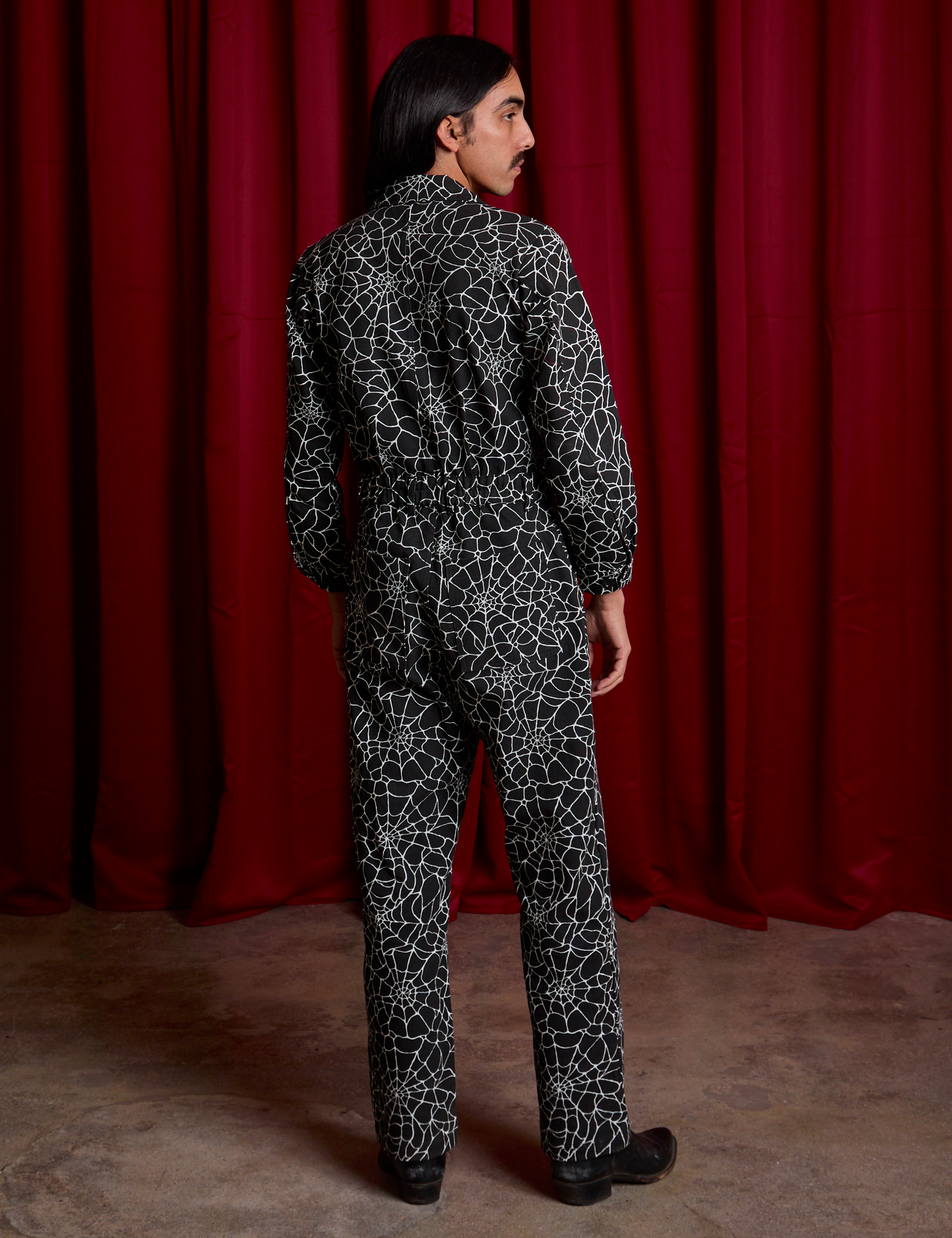 Everyday Jumpsuit in Spiderwebs back view on Anthony