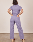 Back view of Short Sleeve Jumpsuit in Faded Grape worn by Tiara