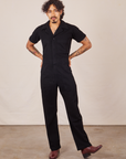 Jesse is 5'7" and wearing S Short Sleeve Jumpsuit in Basic Black