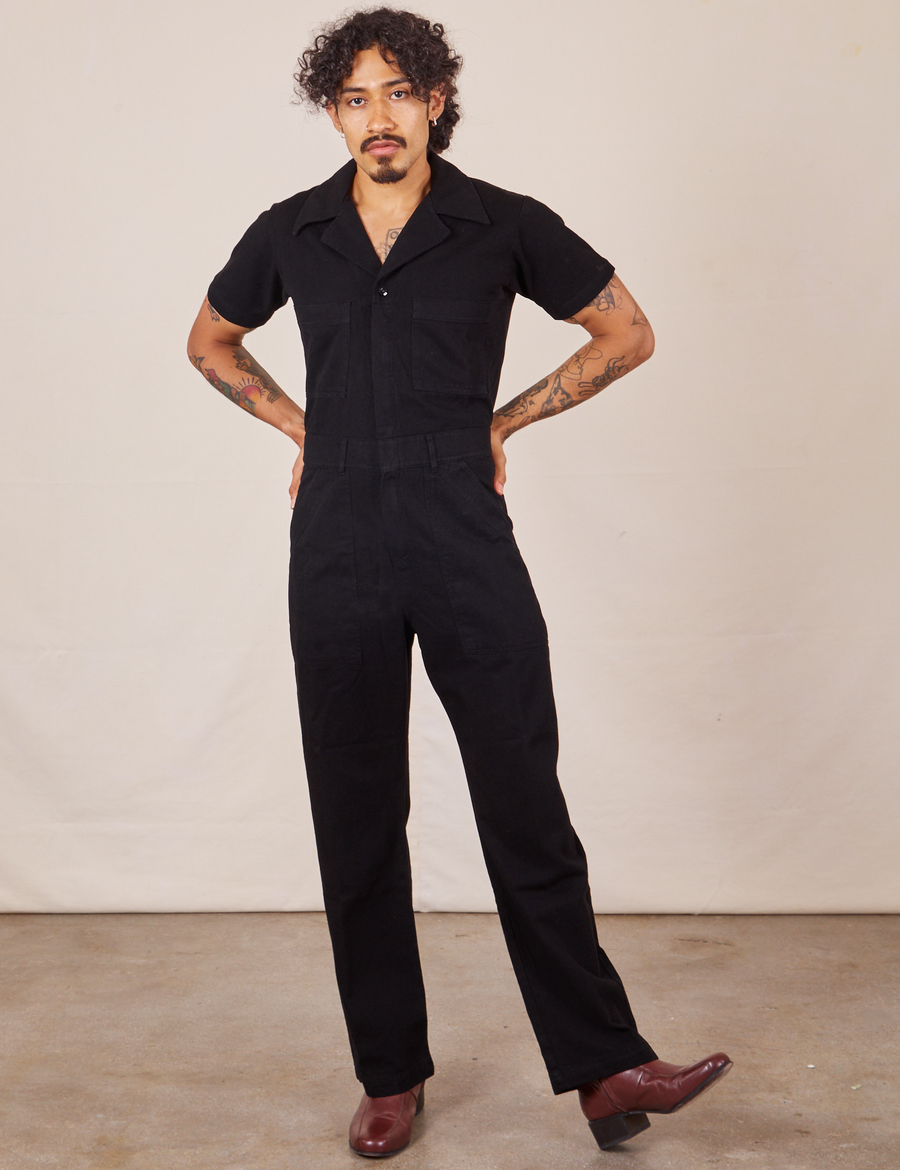 Jesse is 5'7" and wearing S Short Sleeve Jumpsuit in Basic Black