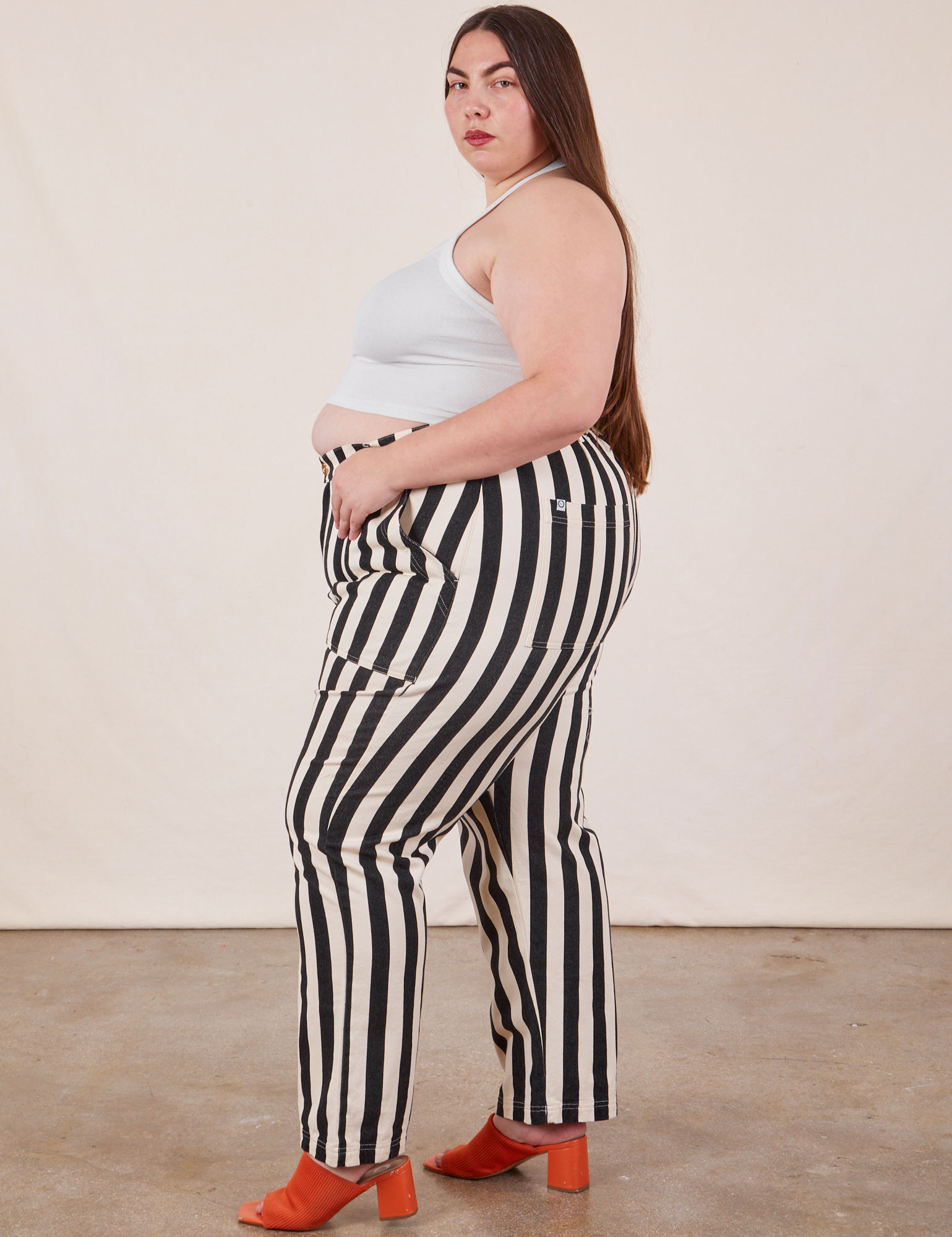 Side view of Black Striped Work Pants in White on Marielena