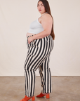 Side view of Black Striped Work Pants in White on Marielena
