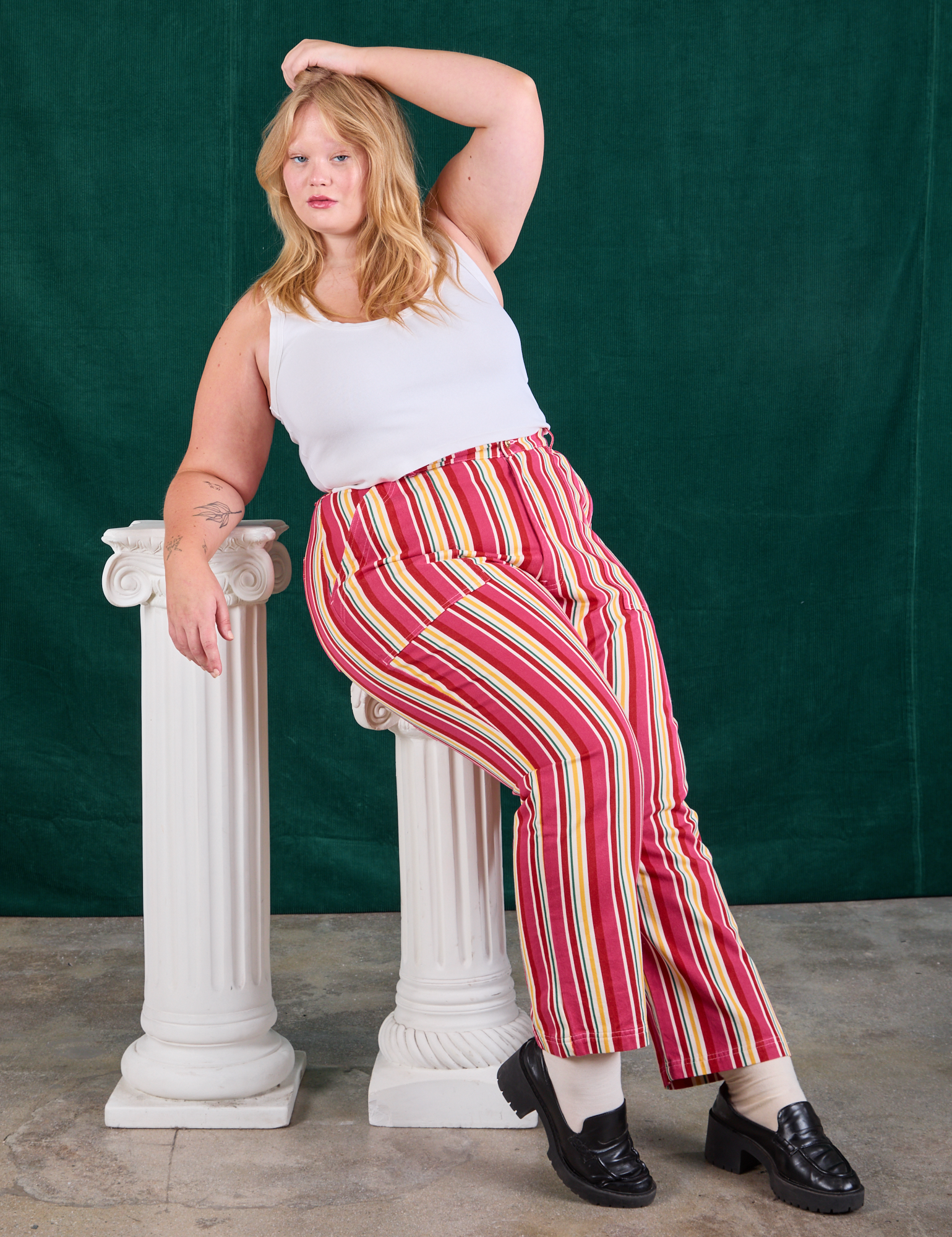 Juliet is wearing Stripe Work Pants in Cherry Candy and Cropped Tank in vintage tee off-white