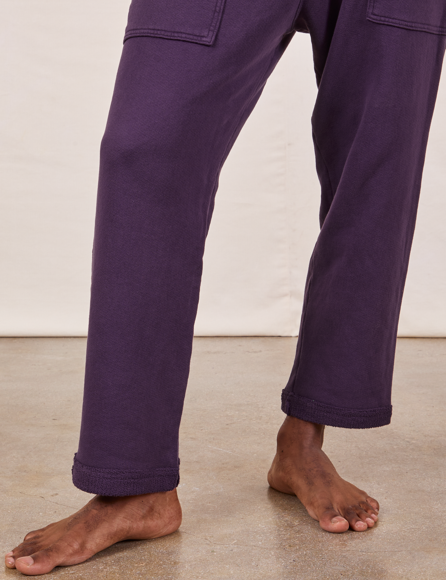 Cropped Rolled Cuff Sweatpants in Nebula Purple pant leg close up on Jerrod