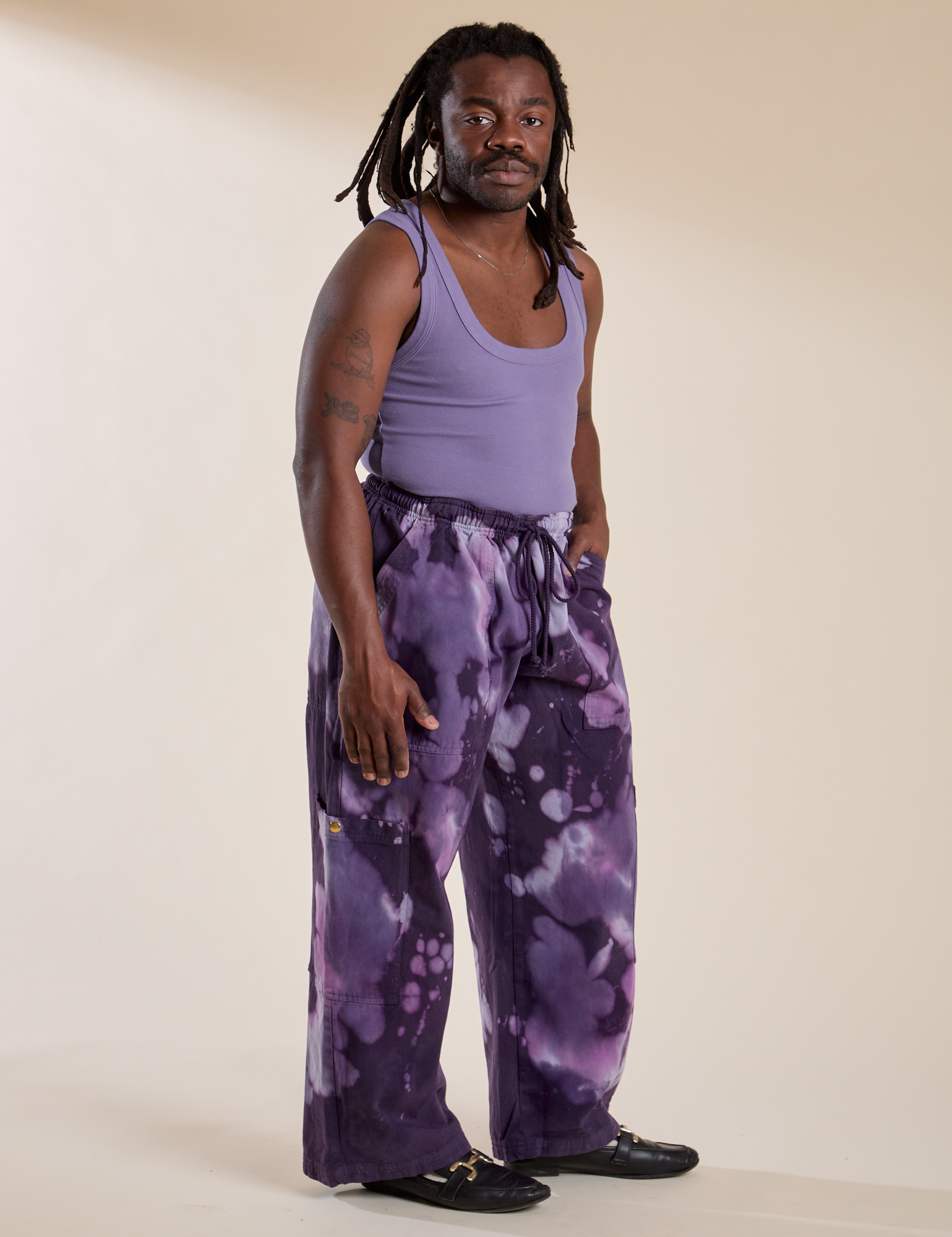 Angled front view of Magic Waters Drop Pocket Pants in Dark Lavender and faded grape Cropped Tank