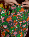 Short Sleeve Jumpsuit in Kitchen Collection back view close up on Alex. 