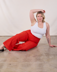 Western Pants in Mustang Red and Cropped Tank in Vintage Tee Off-White worn by Lish