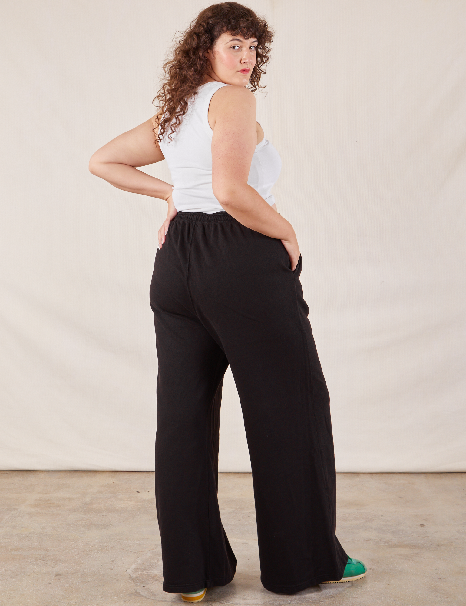 Wide Leg Sweat Pants in Basic Black back view on Ryan