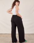 Wide Leg Sweat Pants in Basic Black back view on Ryan