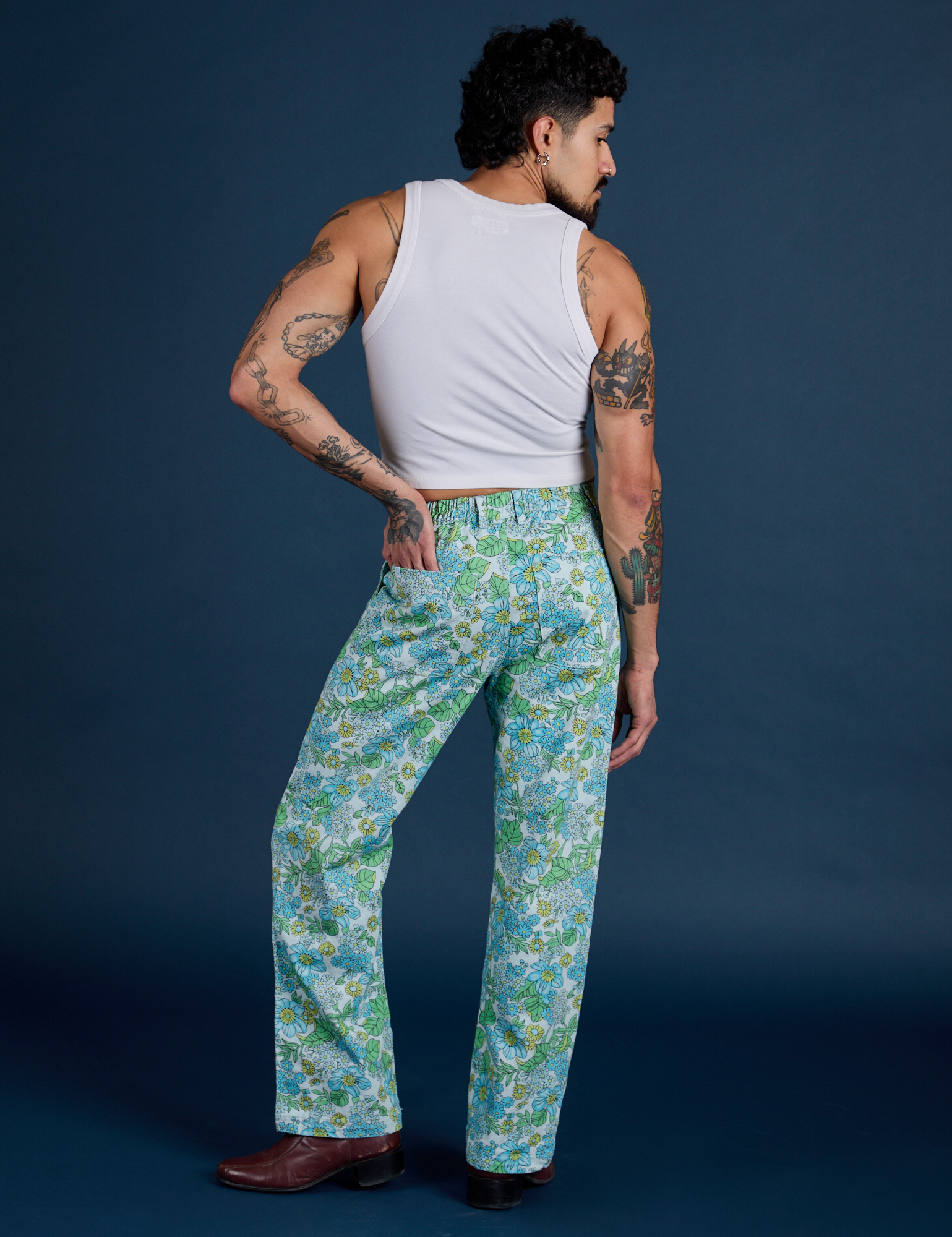 Back view of Winter Floral Print Work Pants and Cropped Tank in Vintage Tee White on Jesse