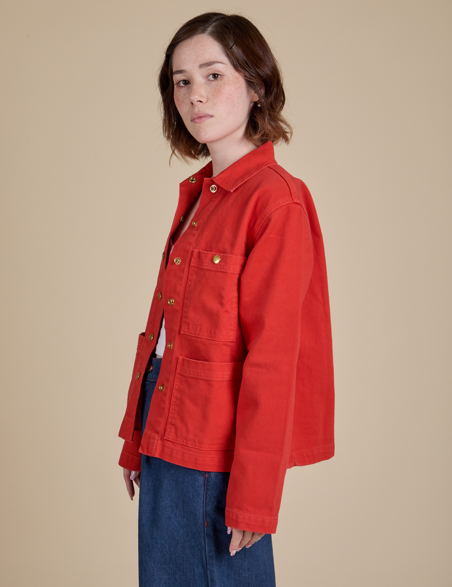 Denim Work Jacket in Mustang Red side view on Hana
