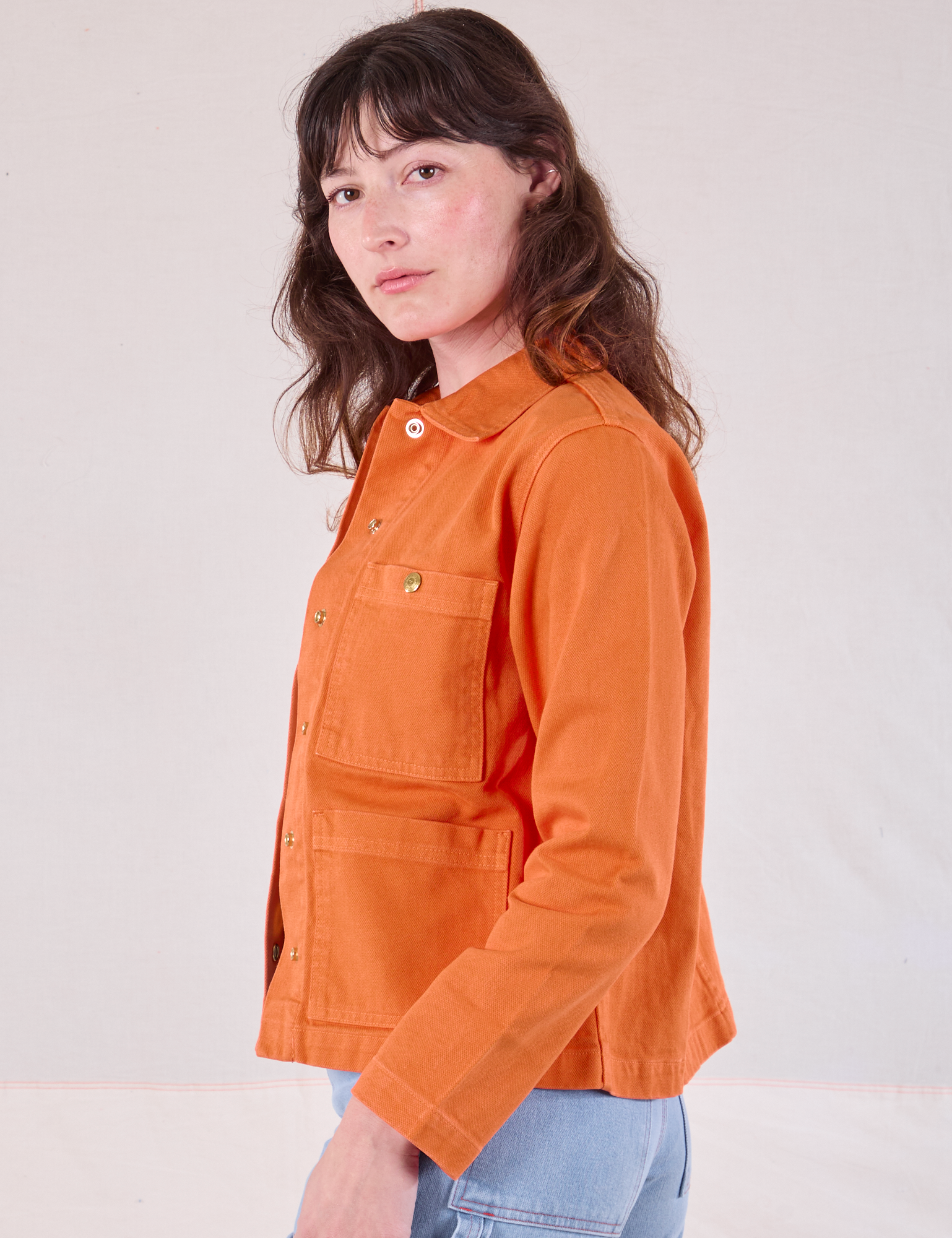 Denim Work Jacket in Construction Orange side view on Alex