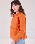 Denim Work Jacket in Construction Orange side view on Alex