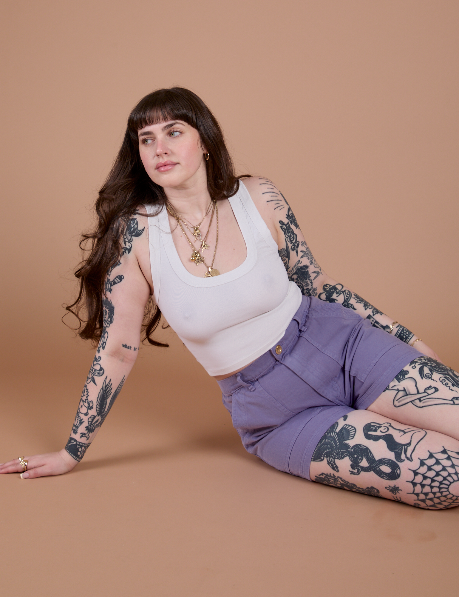 Sydney is wearing Classic Work Shorts in Faded Grape and Cropped Tank in Vintage Tee White