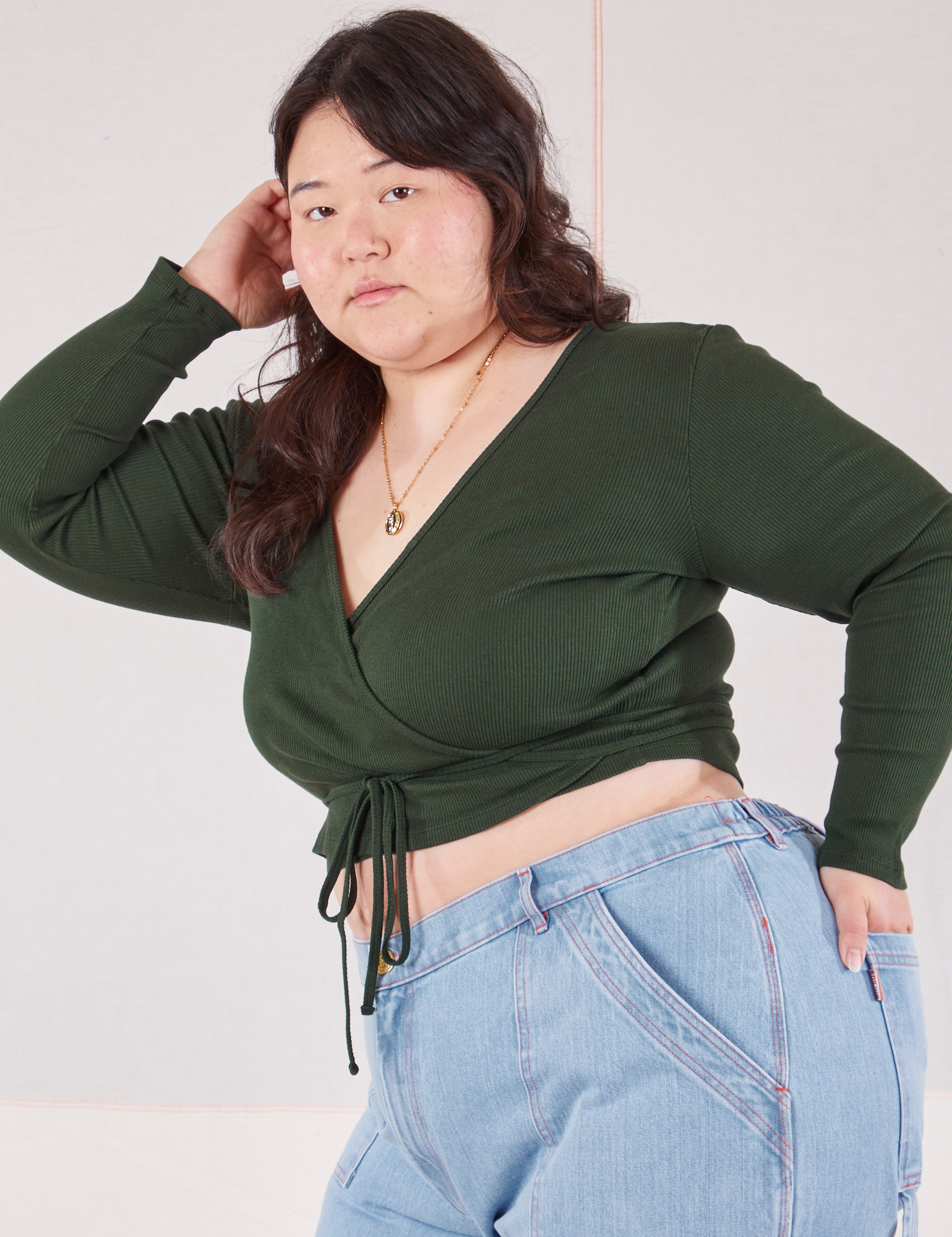 Wrap Top in Swamp Green angled front view on Ashley