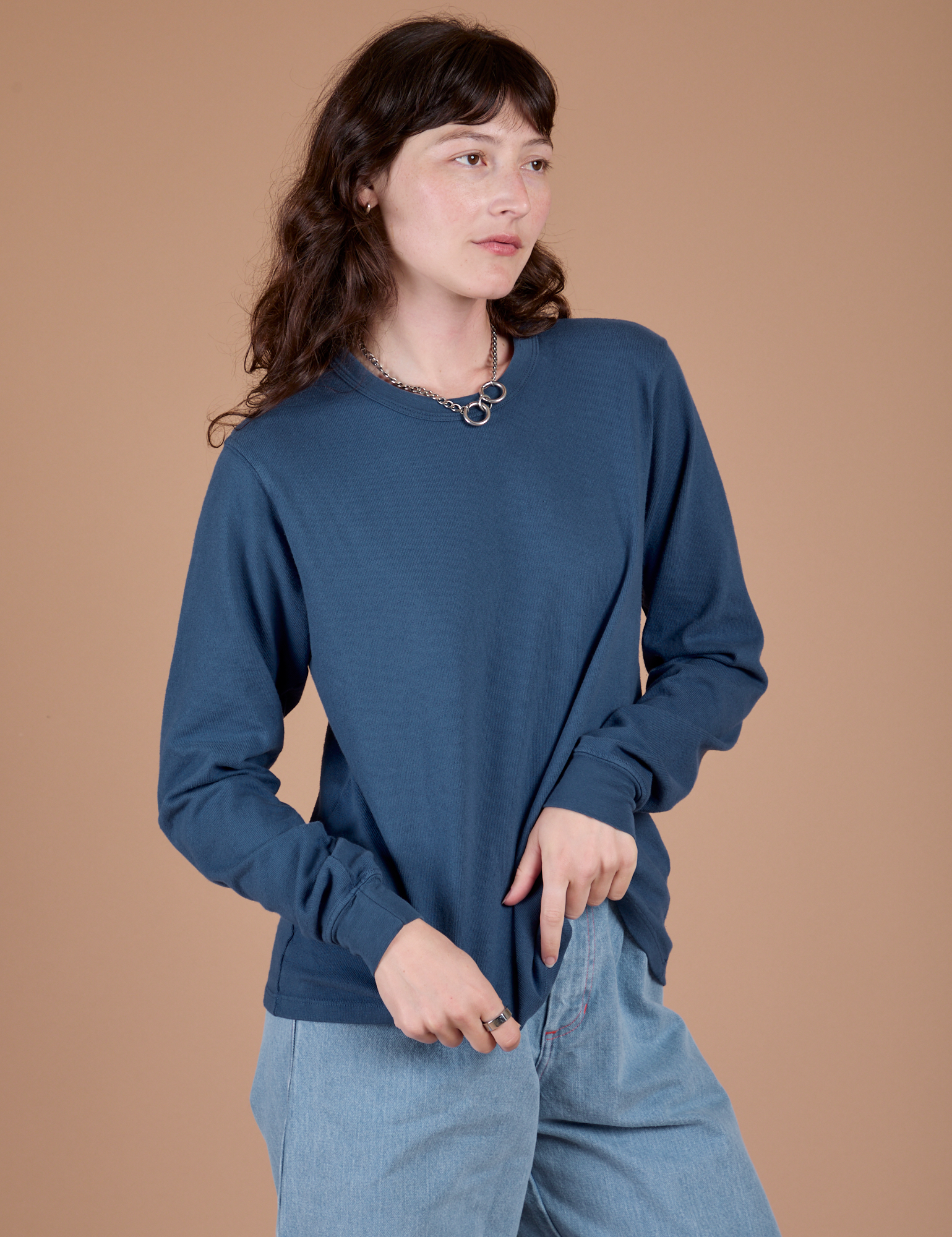 Angled front of Long Sleeve Burly Tee in French Blue on Alex