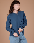 Angled front of Long Sleeve Burly Tee in French Blue on Alex
