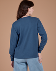Long Sleeve Burly Tee in French Blue back view on Alex