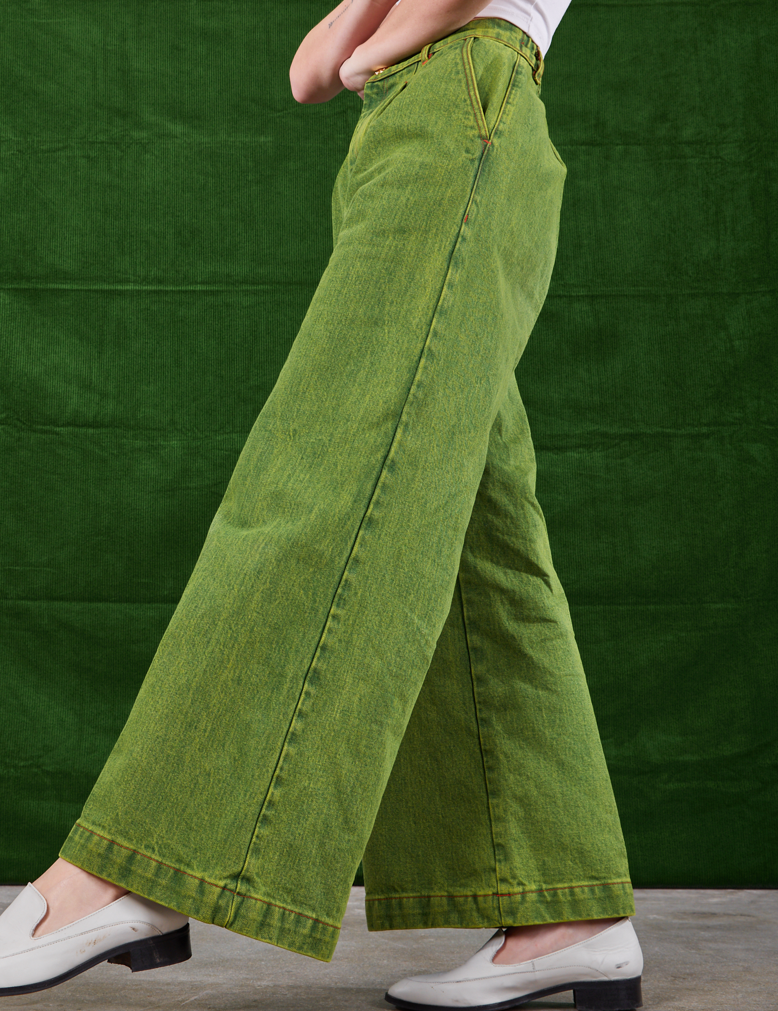 Overdyed Wide Leg Trousers in Gross Green side view on Alex