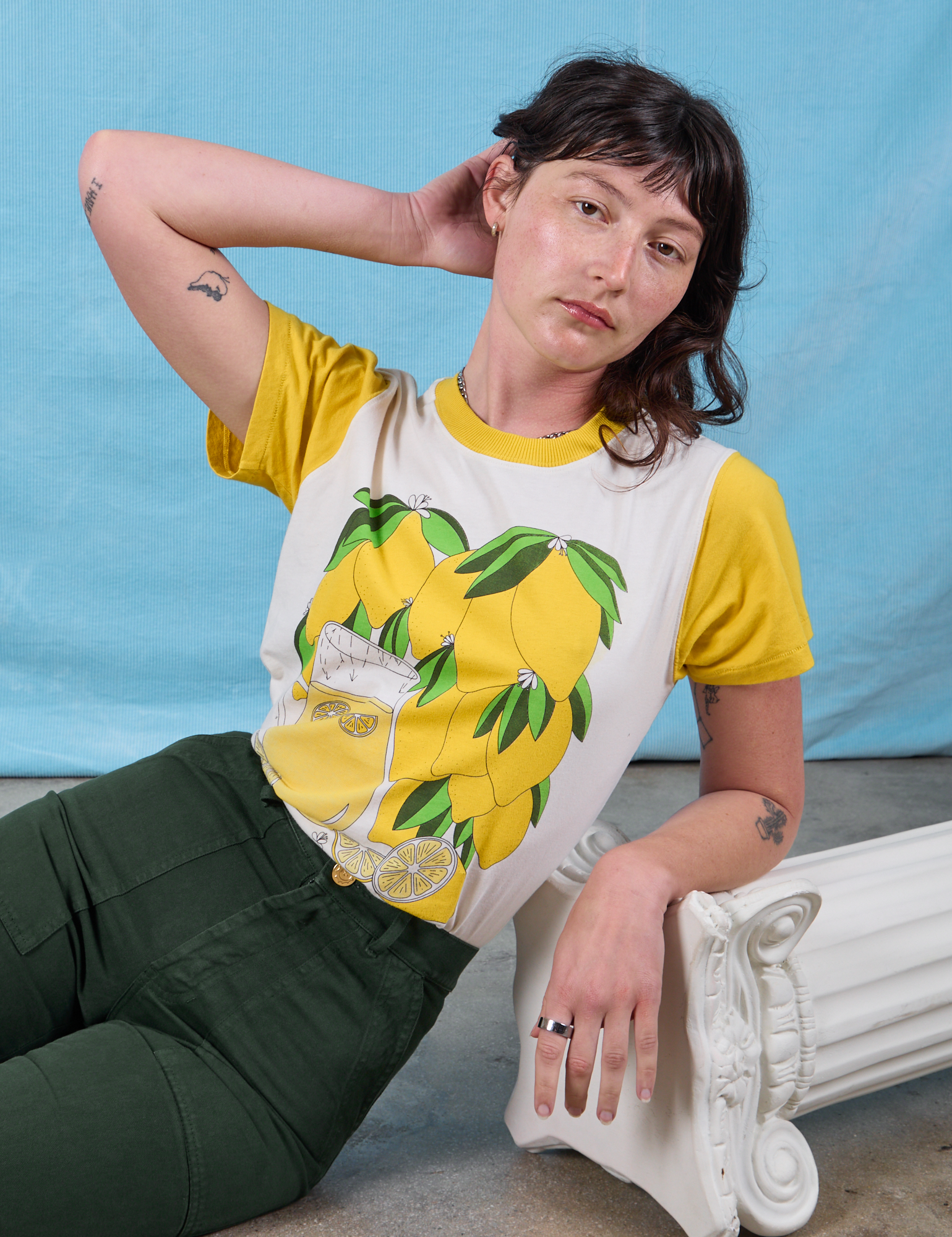 Anniversary Tee in Lemon worn by Alex