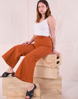 Betty is wearing Bell Bottoms in Burnt Terracotta and Cropped Tank in Vintage Tee Off-White