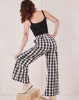 Back view of Wide Leg Trousers in Big Gingham and black Cropped Cami on Alex