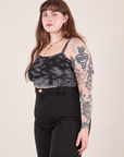 Angled view of Cropped Cami in Black Magic Waters worn by Sydney