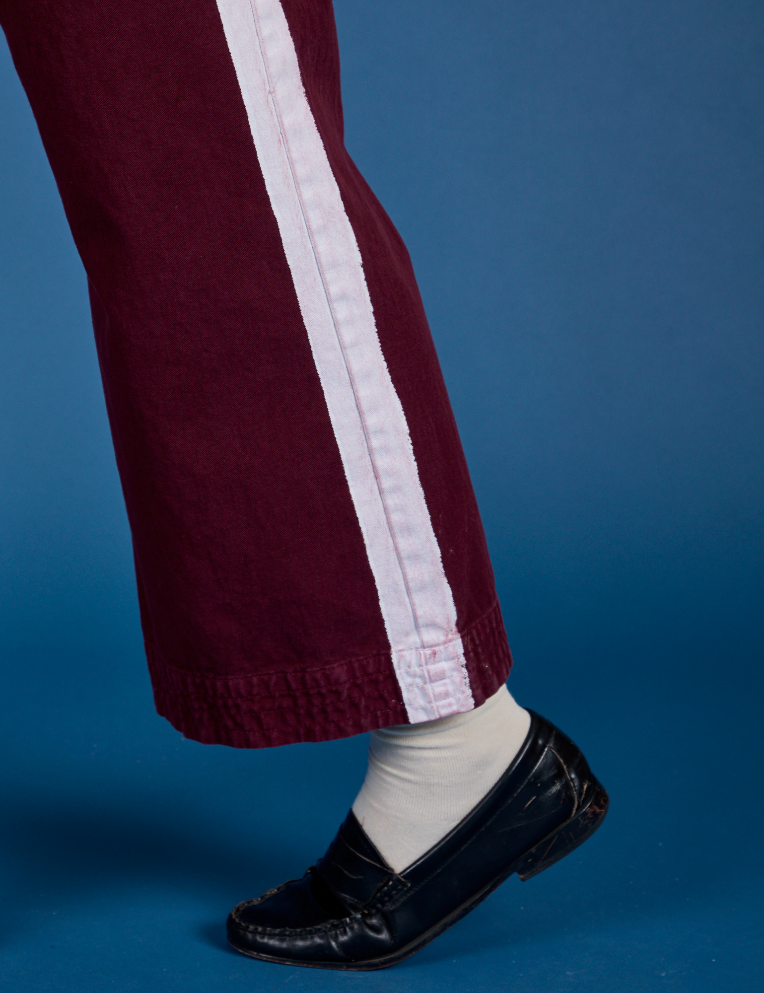 Painted Action Pants in Red Wine pant leg close up