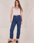 Allison is 5'10" and wearing S Carpenter Jeans in Dark Wash paired with vintage off-white Cami
