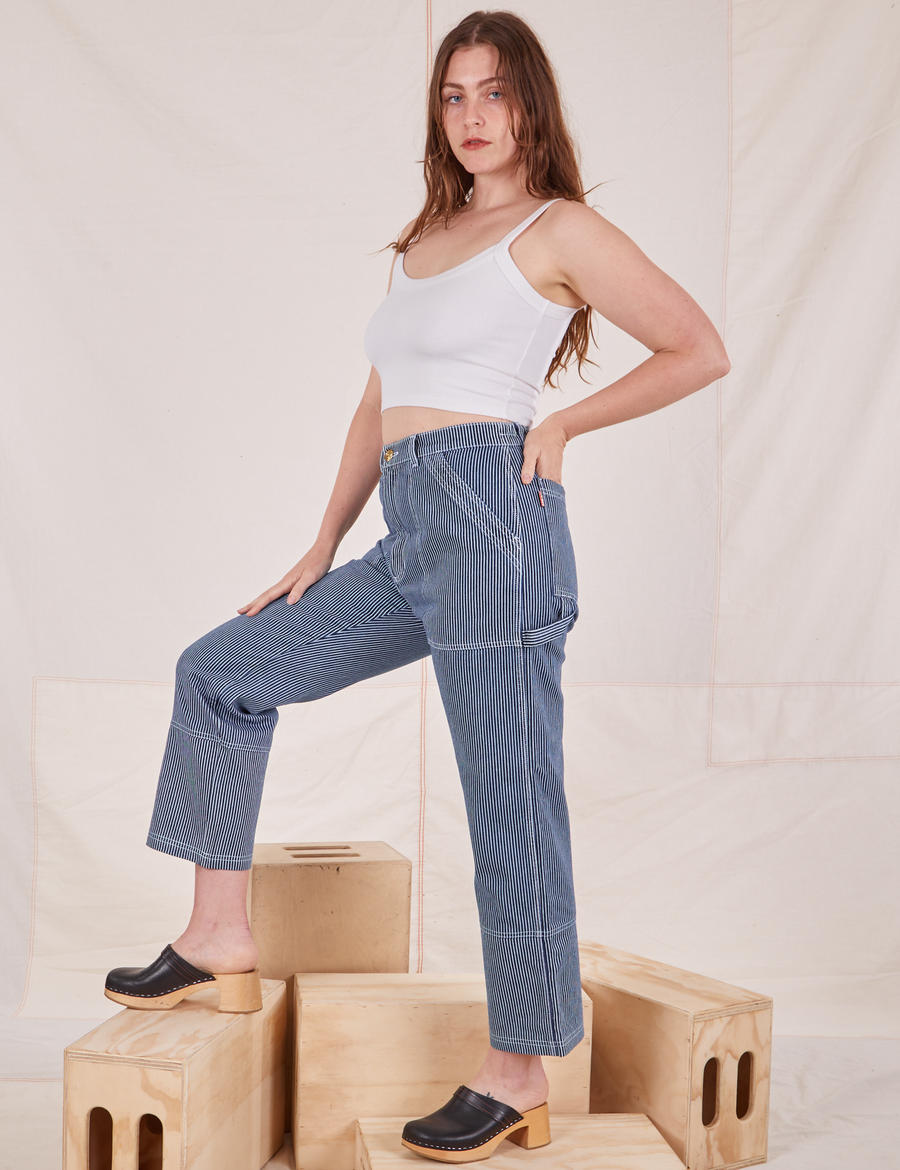 Side view of Carpenter Jeans in Railroad Stripes worn by Allison