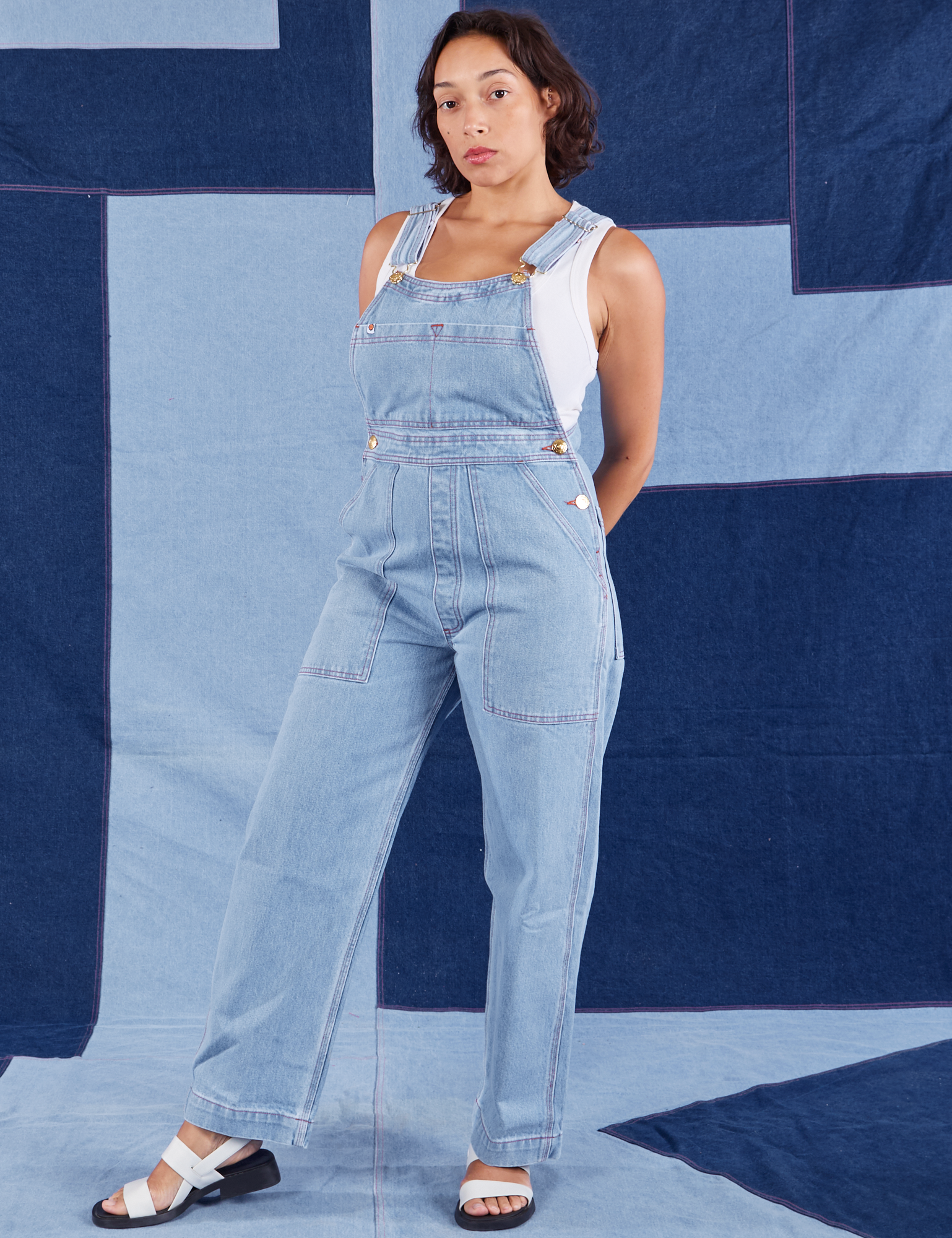 Tiara is wearing Indigo Denim Original Overalls in Light Wash