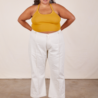Alicia wearing Halter Top in Mustard Yellow and vintage off-white Western Pants