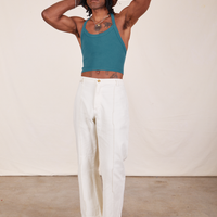 Jerrod is wearing Halter Top in Marine Blue and vintage off-white Western Pants