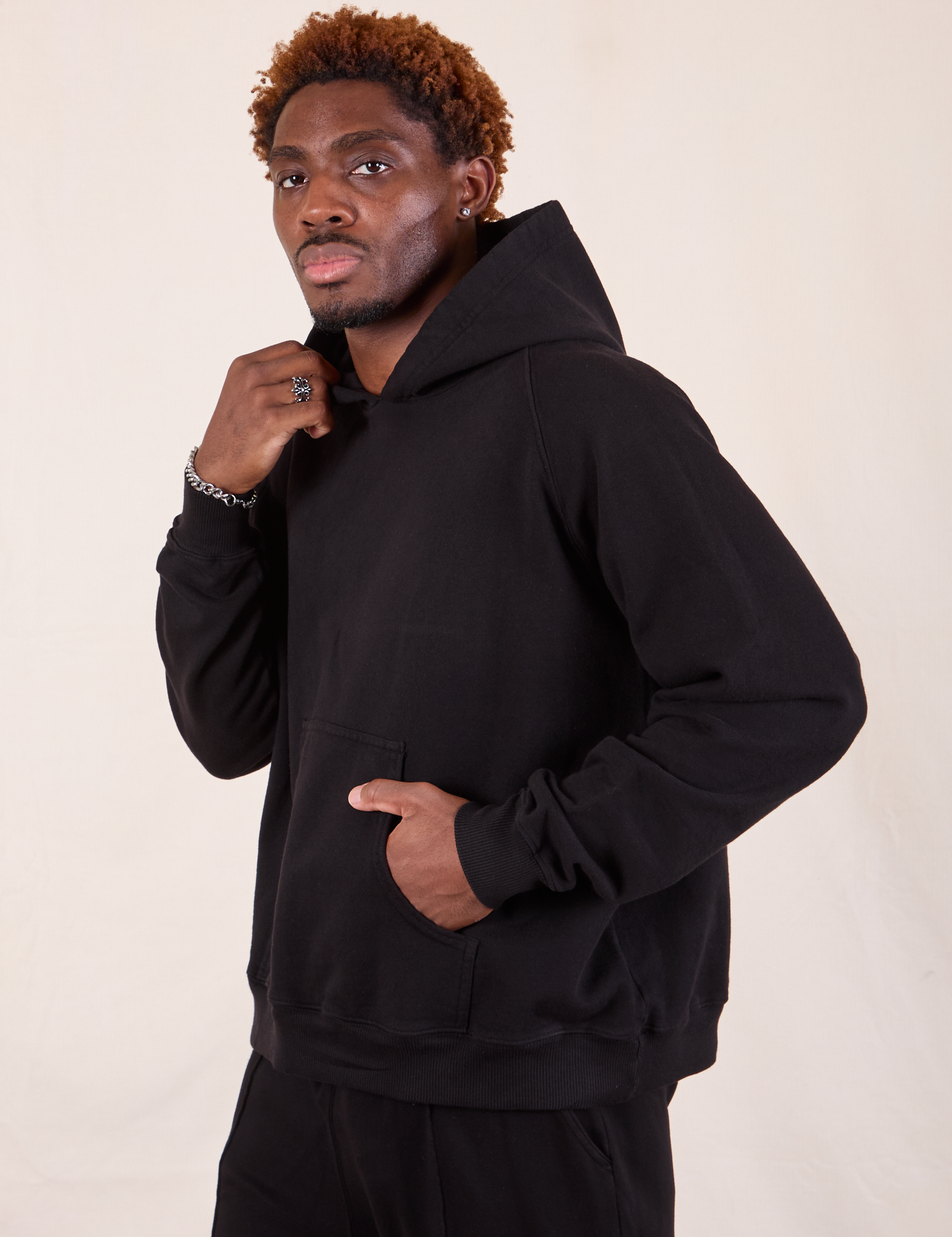 Oversized Hoodie in Basic Black side view on Issac