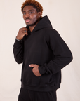 Oversized Hoodie in Basic Black side view on Issac