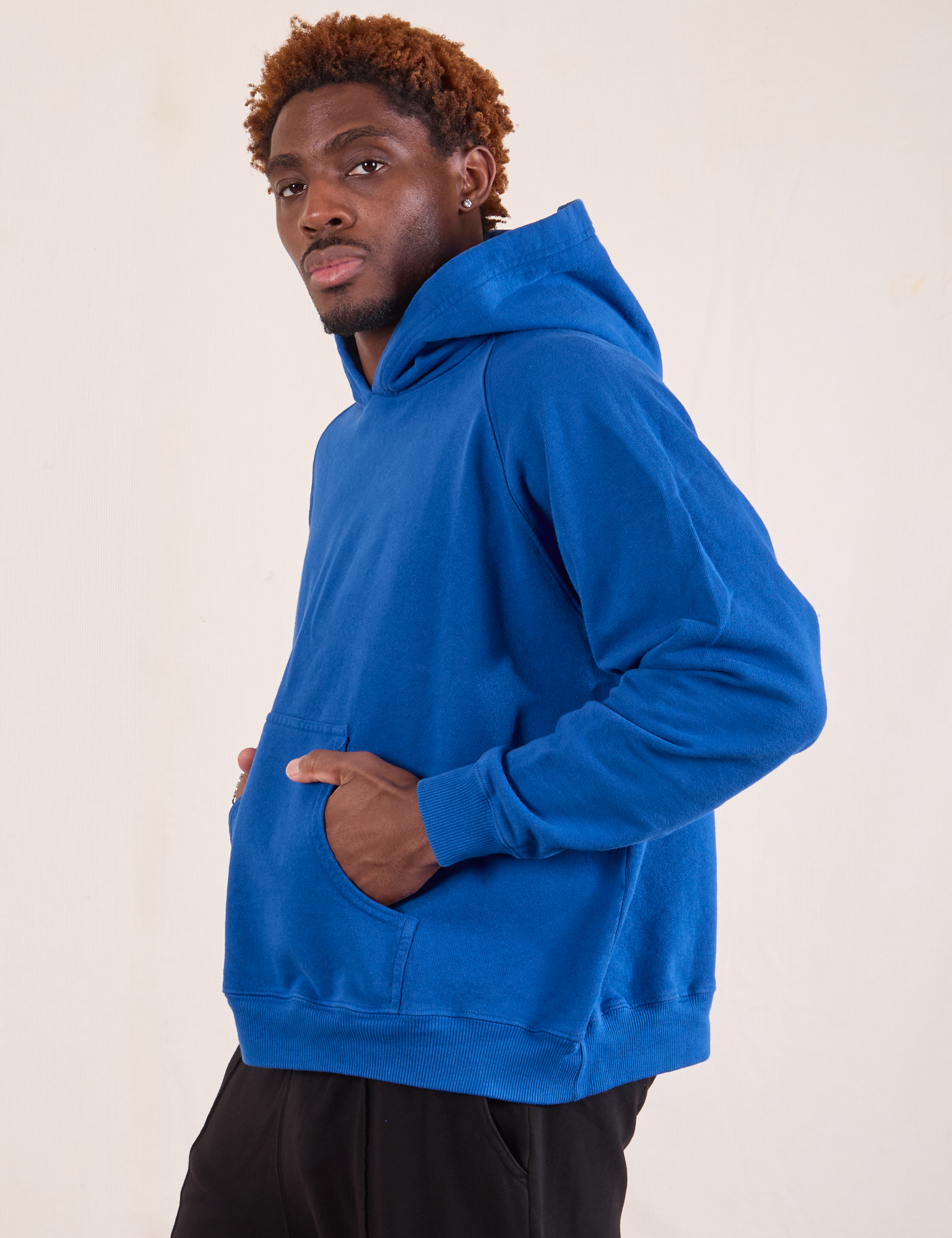 Oversized Hoodie in Royal Blue side view on Issac