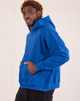 Oversized Hoodie in Royal Blue side view on Issac