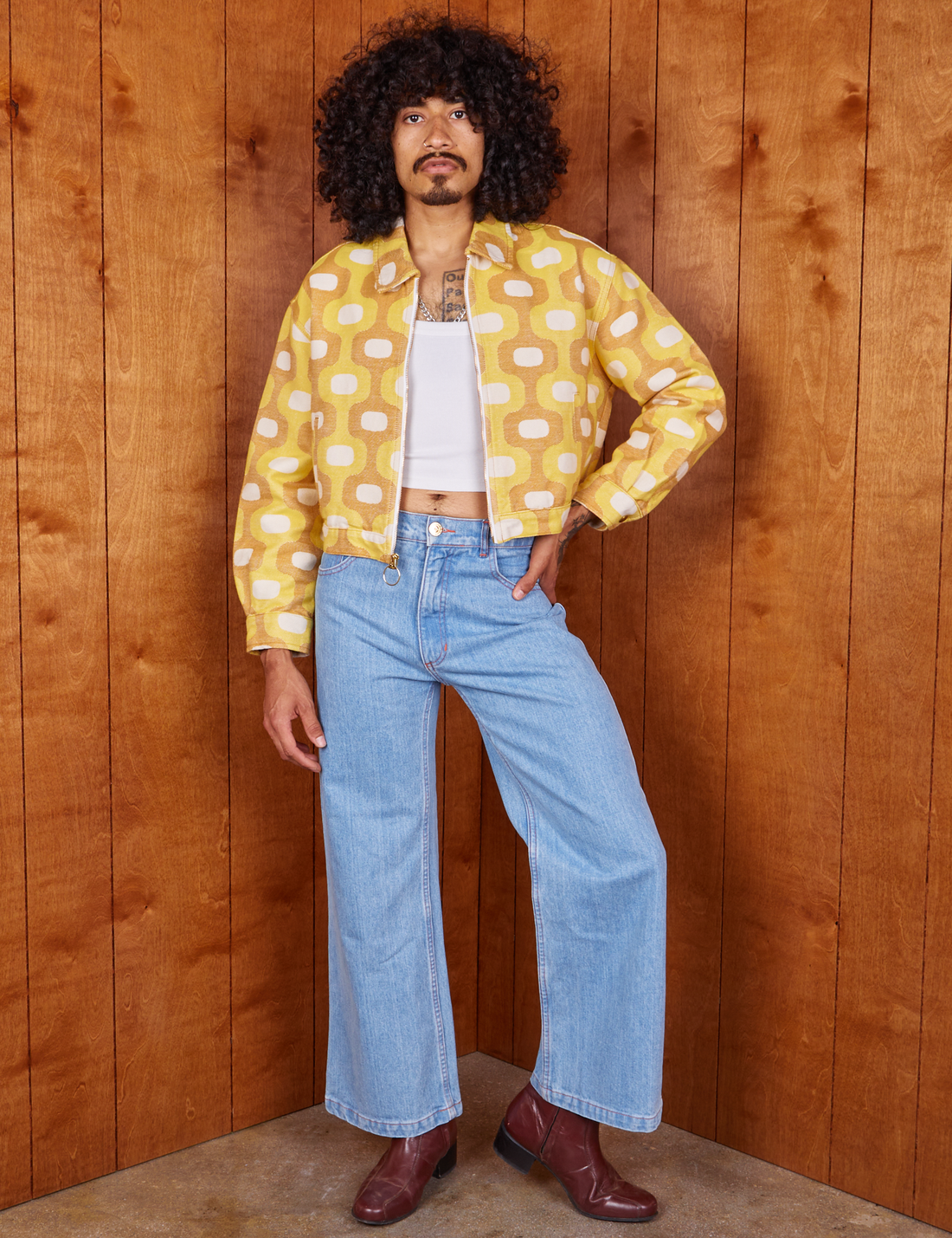 Jesse is 5'8" and wearing XS Jacquard Ricky Jacket in Yellow
