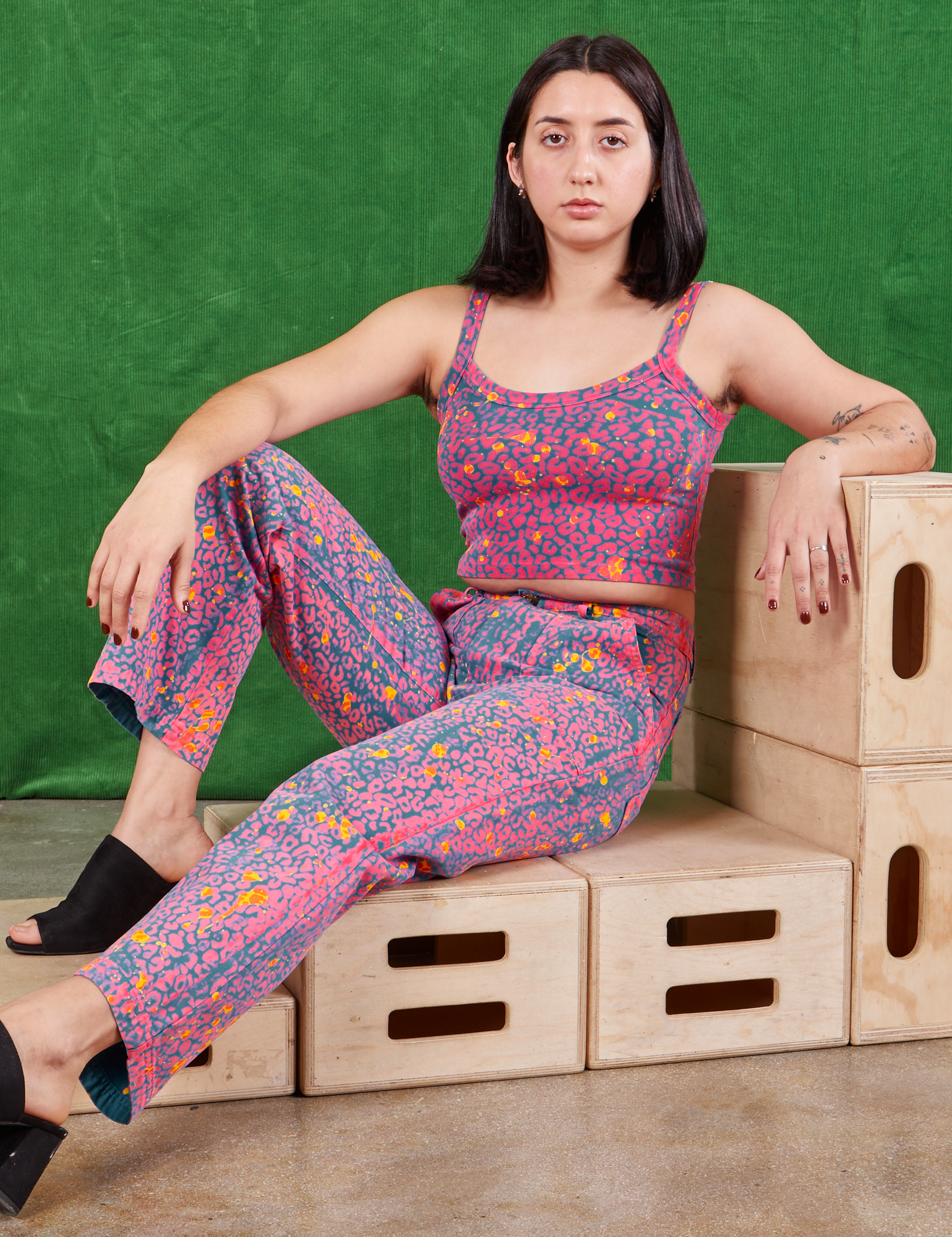 Betty is wearing XXS Cami in Electric Leopard paired with matching Work Pants
