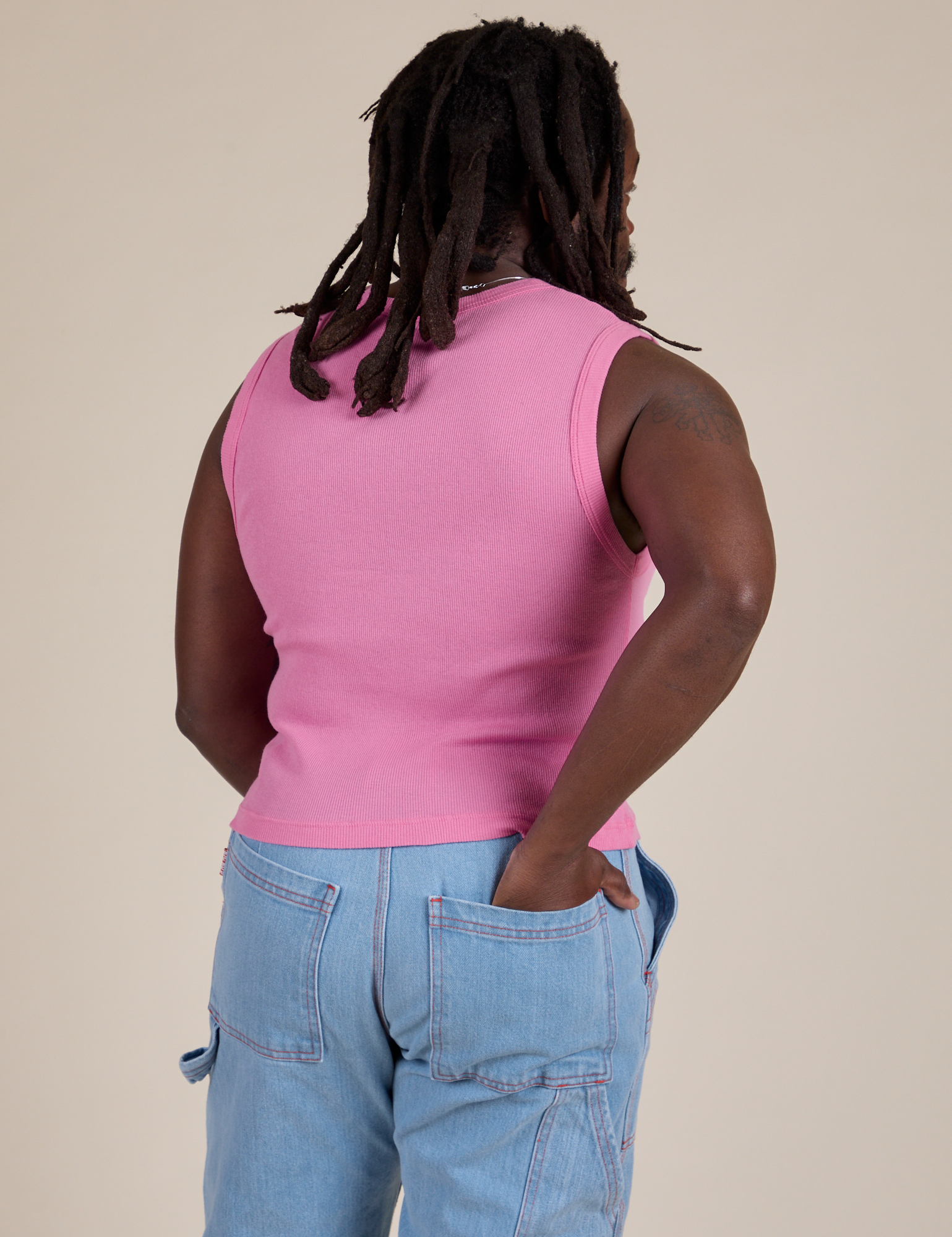 Muscle Tee in Bubblegum Pink back view on Demi