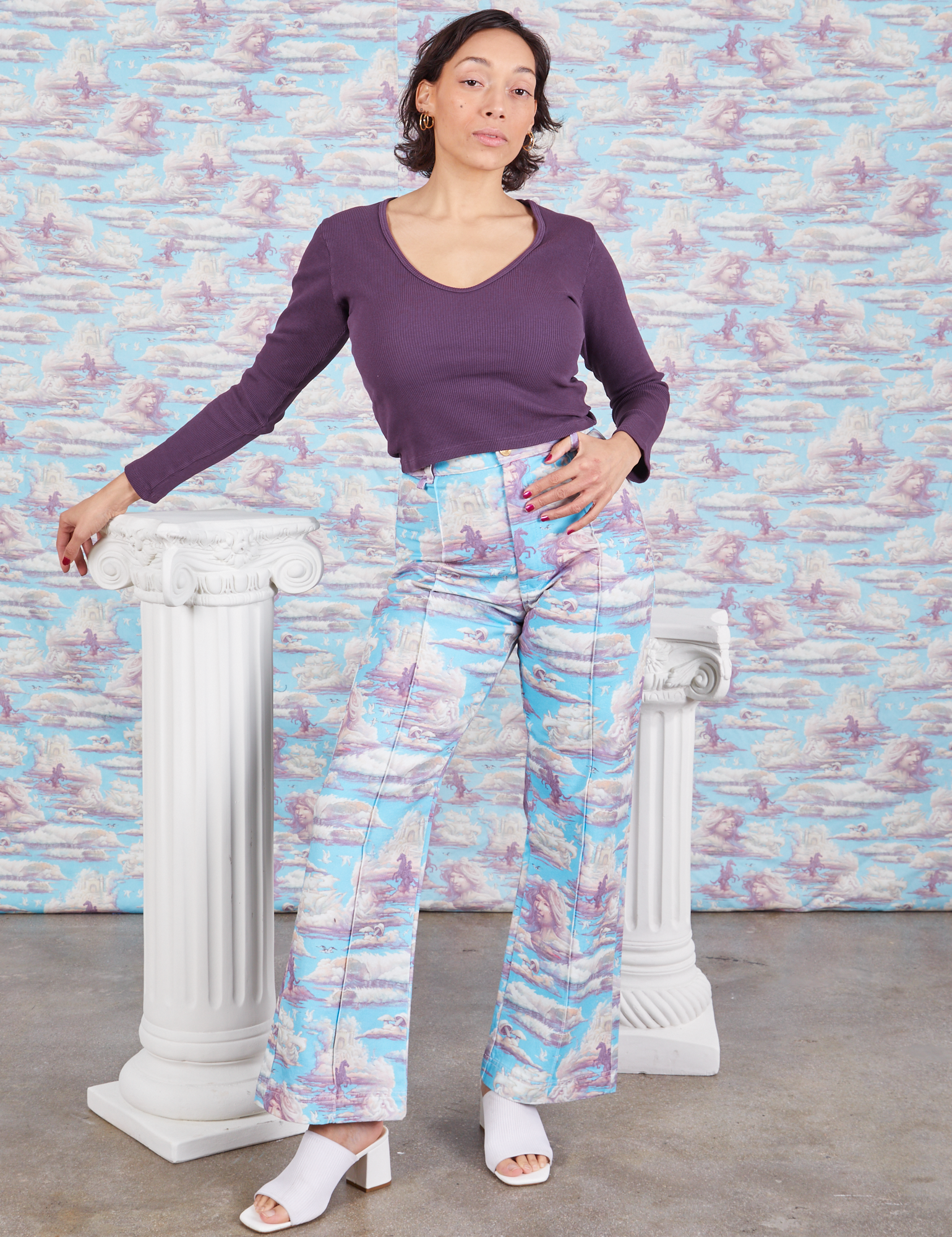 Tiara is 5&#39;4&quot; and wearing S Western Pants in Cloud Kingdom paired with nebula Long Sleeve V-Neck Tee
