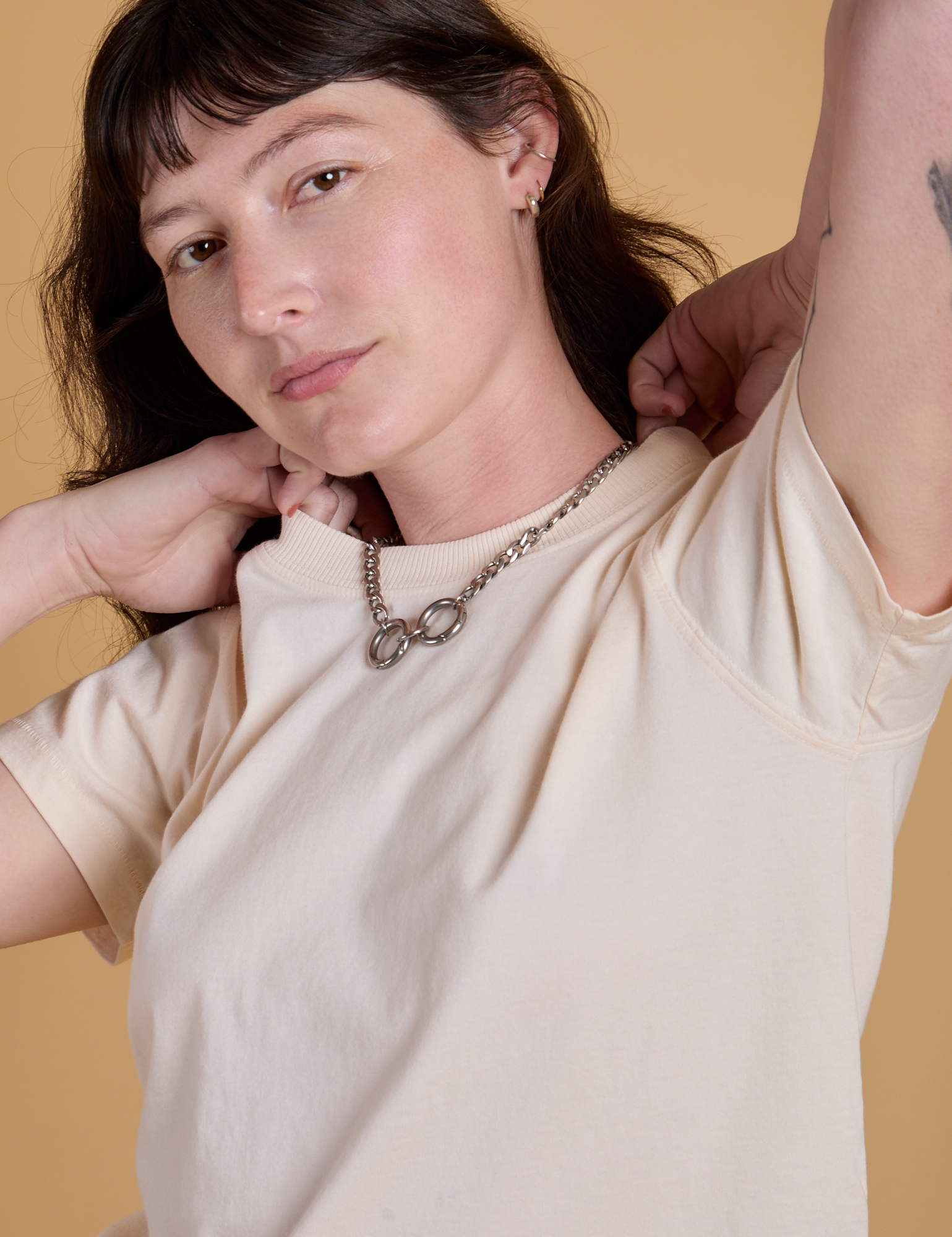 Close up of Organic Vintage Tee in Vintage Off White on Alex